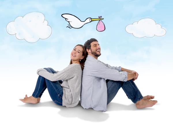 couple with stork cartoon in background