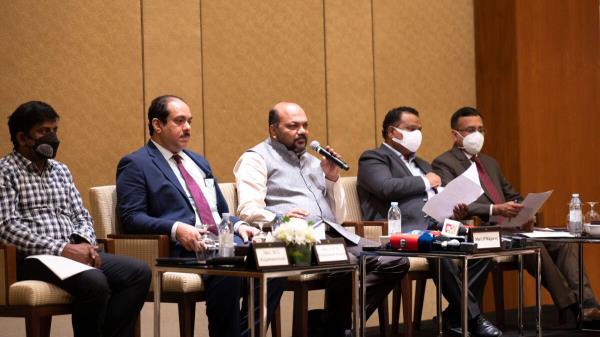 Law P. Rajeeve addresses the press co<em></em>nference in Dubai on Monday. M. G. Rajamanickam, APM Mohammed Hanish, principal secretary; and Dr K. Ellangovan, S. HariKishore, were also present. — Photo by Shihab  